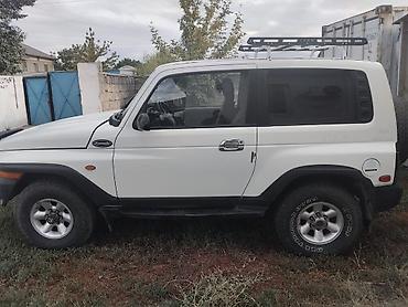 трёхдверный: Ssangyong Korando: 2001 г., 2.3 л, Механика, Дизель, Внедорожник — 3