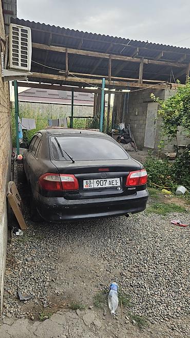 mazda 623: Mazda 626: 2001 г., Механика, Седан — 3