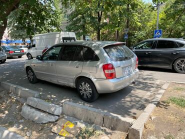 опель вектора с: Mazda 323: 2002 г., 1.5 л, Робот, Бензин, Хэтчбэк