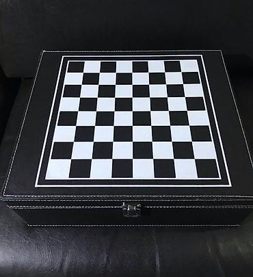 Şahmatlar: Şahmat dəsti, qızılı və gümüşü rəngli parçaları olan, qara rəngli -da lalafo.az — 9 Şahmatlar: Şahmat dəsti, qızılı və gümüşü rəngli parçaları olan, qara rəngli — 9