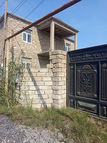 İki mərtəbəli daş tikili ev - Plan: 2 mərtəbə, eyvanlı giriş. Hündür