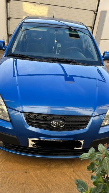 авто фольксваген поло: Kia Rio: 1.4 л | 2006 г. Седан