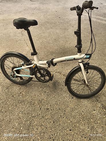 velosiped cross: BTWIN firma alüminium qatlanan velosiped. Portuqaliya istehsalıdır. 20 — 3