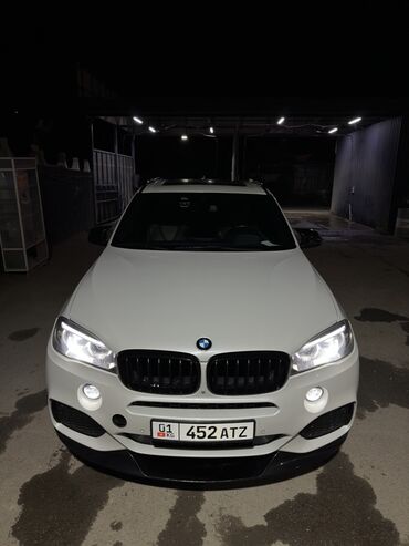 фара на дайво нубира: Белый внедорожник BMW X5 с черной решеткой радиатора и черными