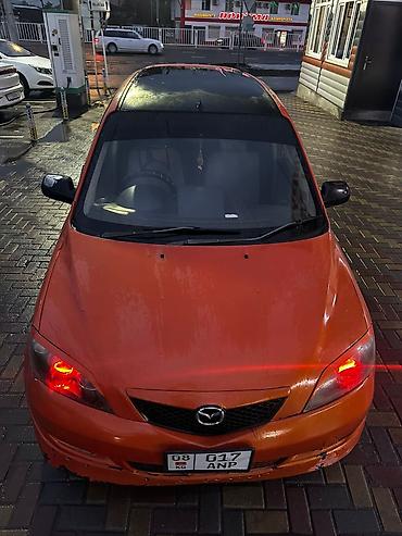 Mazda: Mazda Demio: 2003 г., Автомат — 7
