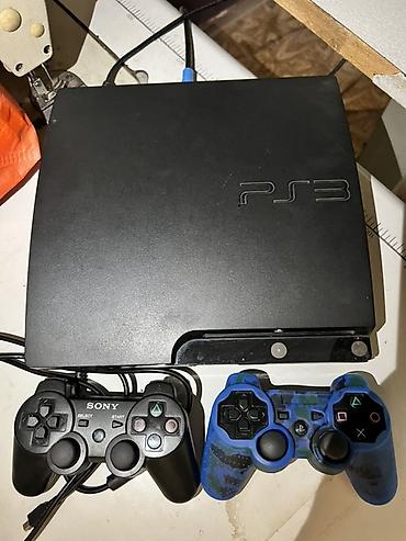 PS3 slim (прошитый hen). 2 джойстика один оригинал один реплика at lalafo.kg PS3 slim (прошитый hen). 2 джойстика один оригинал один реплика