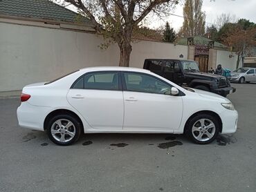 Toyota: Toyota Corolla: 1.6 l | 2010 il Sedan — 1
