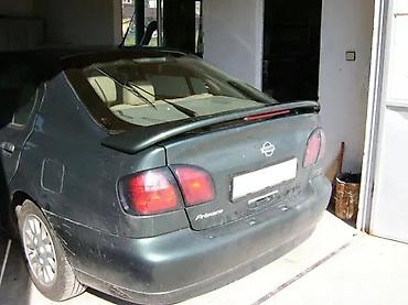 Spojleri: LIP SPOJLER REP ZA GEPEK NISSAN PRIMERA P11 (2) | Spojler za zadnja — 2