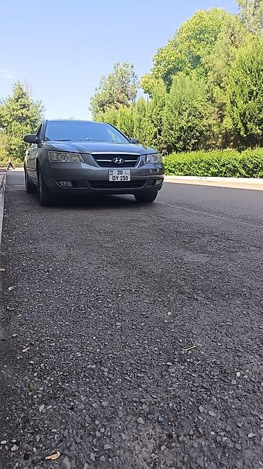 maşın 09: Hyundai Sonata: 3.3 l | 2005 il Sedan — 1