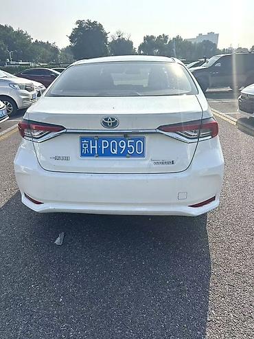 sonata 2004: Toyota Corolla: 2023 г., Гибрид, Седан — 4