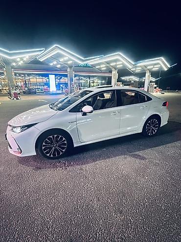 тойота аква гибрид: Toyota Corolla: 2021 г., 1.8 л, Автомат, Гибрид, Седан — 6