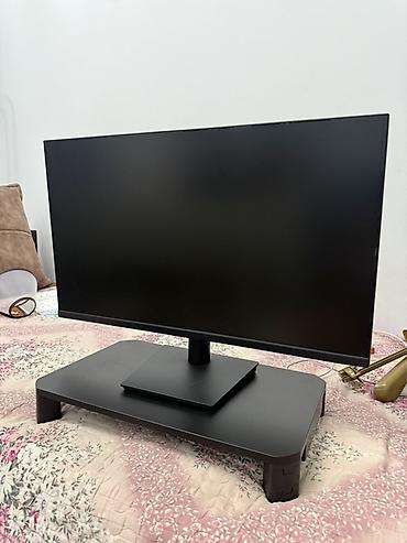 Монитор Xiaomi в чёрном цвете с тонкими рамками и лаконичным
