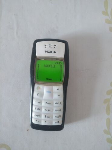 sade nokia: Nokia C110, rəng - Gümüşü, Düyməli, Zəmanət