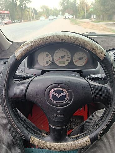Mazda: Mazda Familia: 2003 г., 1.5 л, Механика, Бензин, Универсал — 6