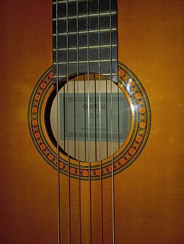 Klassik gitaralar: Klassik gitara, Yamaha, İşlənmiş, Ünvandan götürmə — 3