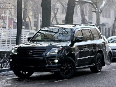 Дроны: Продаю Lexus LX 570 в хорошем состоянии юбилей Чёрный салон на чёрный — 1