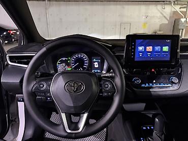 byd e3: Toyota Corolla: 2022 г., 1.8 л, Вариатор, Гибрид, Седан — 7