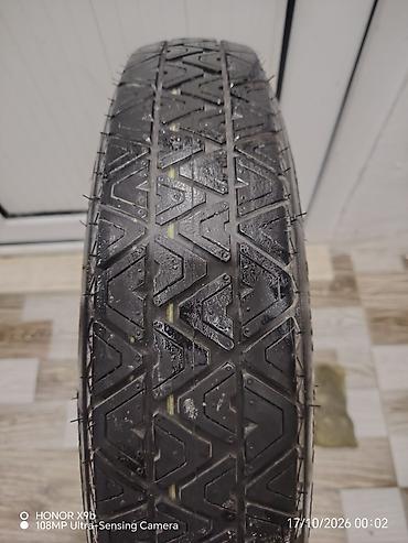 disk teker barter: Zavod BMW E46 nın üzərinde gələn zapas təkər, continental firması, təp — 2