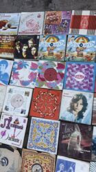 Виниловые пластинки: Виниловые пластинки. 
На фото всё видно — 5