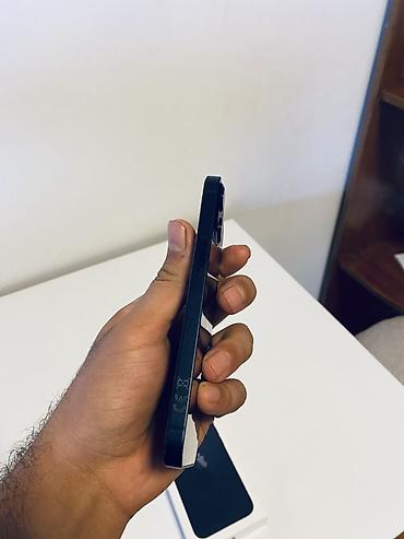 iphone 21: IPhone 13, 128 GB, Qara, Face ID — 8