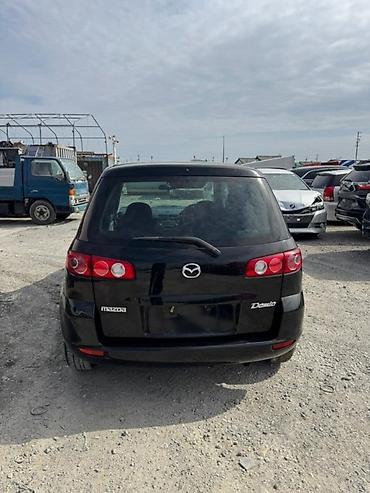 демио багажник: Крышка багажника Mazda, 2003 г., Б/у, Оригинал — 1