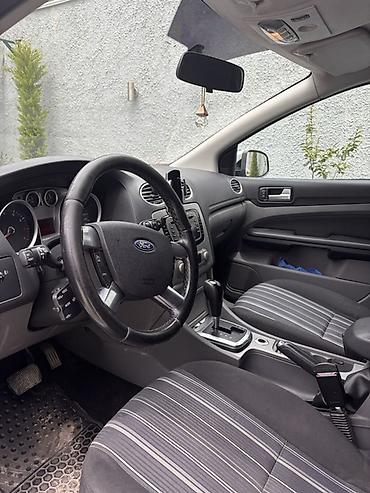 kia rio qapi: Ford Focus – gümüşü rəng, 5 qapılı hetçbek. Texniki və xarici — 5