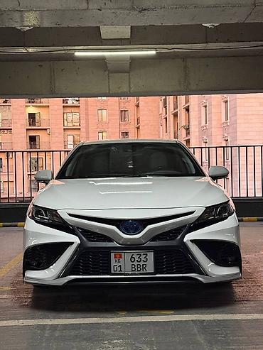 corolla 2018: Toyota Camry: 2021 г., 2.5 л, Вариатор, Гибрид, Седан — 1