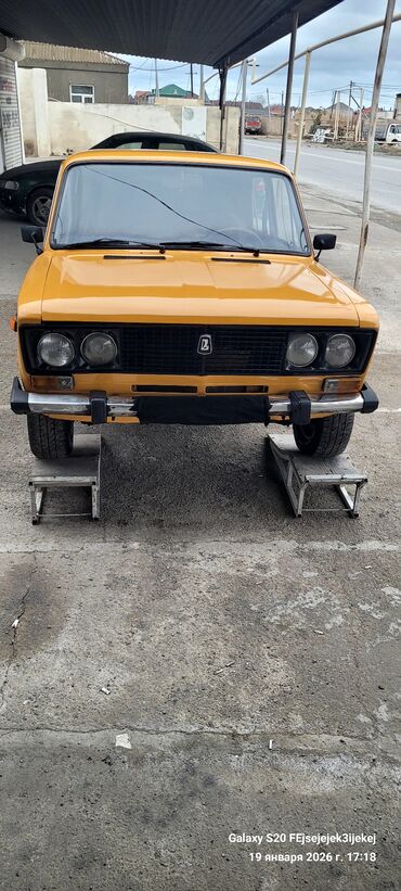 VAZ (LADA): VAZ 2106, sarı rəngli sedan Müəssisə: VAZ Model: 2106 (klassik — 1