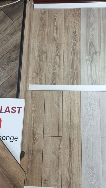 Laminat: Məhsul: Laminat döşəmə örtükləri və aksesuarları Təsvir: - Mağazada — 6