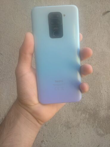 ağ evdəki telefon: Redmi 9 tecli satlir 64 yadas hec bir problemi yox du