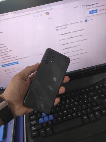 Мобильные телефоны и аксессуары: Samsung Galaxy A13, 64 ГБ, цвет - Черный
