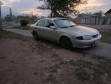 Mazda: Mazda 2: 2001 г., 2 л, Автомат, Бензин, Седан — 6