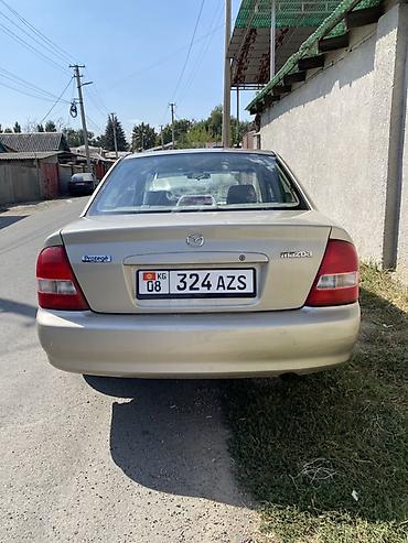 mazda 2004: Mazda 323: 2003 г., Автомат, Бензин, Седан — 7