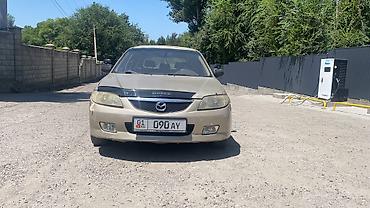 рекистон пикап: Mazda 323: 2001 г., 1.6 л, Автомат, Бензин, Универсал — 1