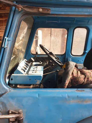 Тракторы МТЗ (Беларус): Трактор МТЗ «Беларус» с кабиной, сзади трехточечная навеска и ВОМ — 7