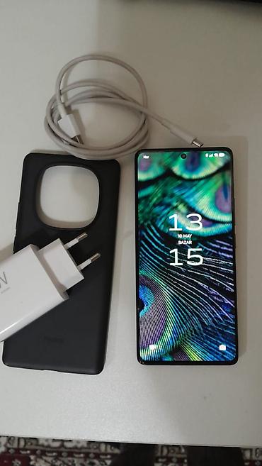 14 pro: Redmi 14 pro 256 telefonda cızıq belə yoxdu adapdiri orginal — 1