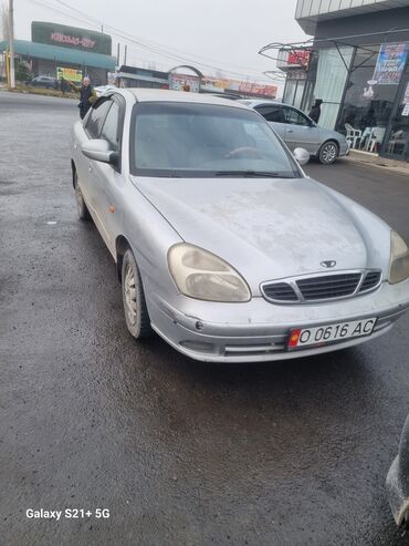 Daewoo: Daewoo Nubira: 2002 г., 1.4 л, Механика, Бензин, Седан