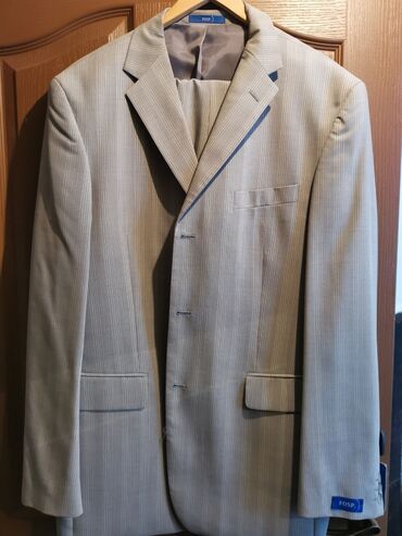 Продаю брючный костюм из шерсти фирмы FOSP Онегин 52 размер новый