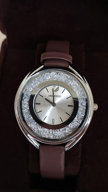 swarovski saat: Swarovski qadın qol saatı - Klassik dairəvi korpus, gümüşü rəngli — 2