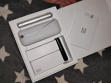 Şəxsi əşyalar: Lil SOLID DUAL (IQOS təqdimatı) – tütün isidən cihaz Qutu tərkibi: - — 2