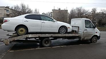 Услуги эвакуатора: С лебедкой, С ломаной платформой, С манипулятором — 12