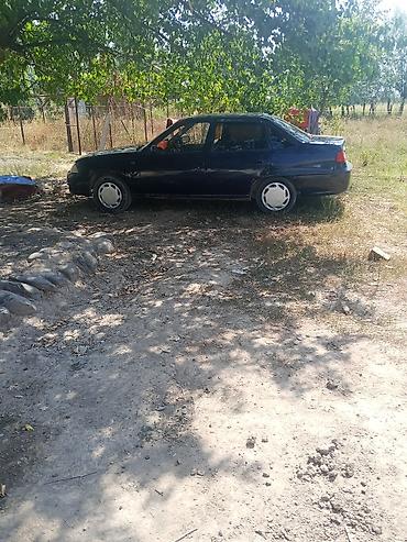 bud e9: Daewoo Nexia: 2010 г., Бензин, Седан — 4
