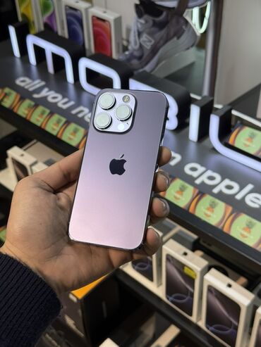 Apple iPhone: IPhone 14 Pro, 128 GB, Deep Purple, Simsiz şarj — 1