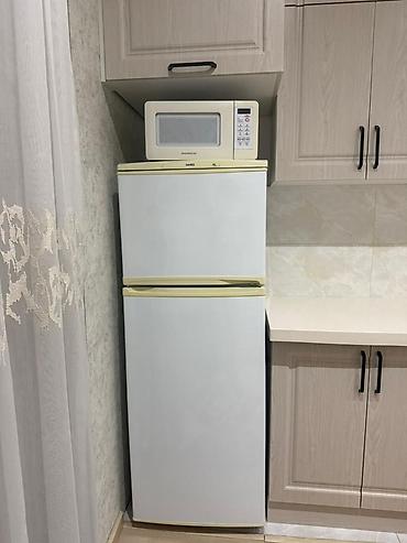 Mətbəx texnikası: NORD iki qapılı soyuducu - Rəng: ağ, açıq krem çalarları ilə - Üst — 1