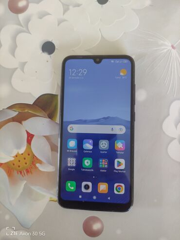 Мобильные телефоны и аксессуары: Xiaomi Mi Play, 64 ГБ, цвет - Черный, 
 Сенсорный, Отпечаток пальца, Две SIM карты