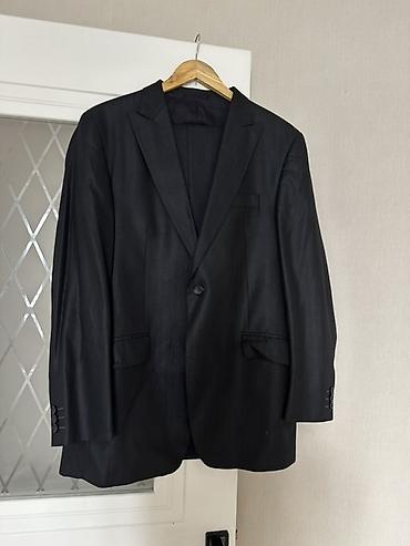 Костюмы: Классические мужские пиджаки темных оттенков. Цены начинаются от — 3