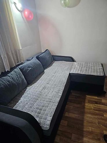 Ugaona garnitura sa ležajem i tabure/otomanskim produžetkom - Model