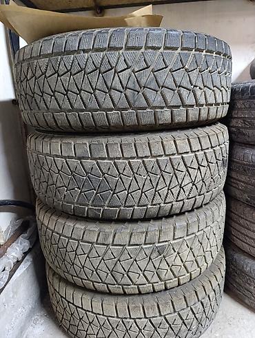 Комплект зимних шин Bridgestone Blizzak DM-V2 - Размер: 265/65 R17 - at lalafo.kg Комплект зимних шин Bridgestone Blizzak DM-V2 - Размер: 265/65 R17 -