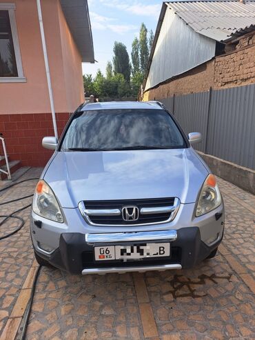 диск на срв: Honda CR‑V, 2‑е поколение (рестайлинг). Серебристый кроссовер