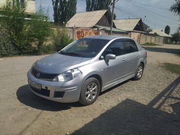 ключ автомобиля: Nissan Tiida: 2010 г., 1.6 л, Механика, Газ, Седан